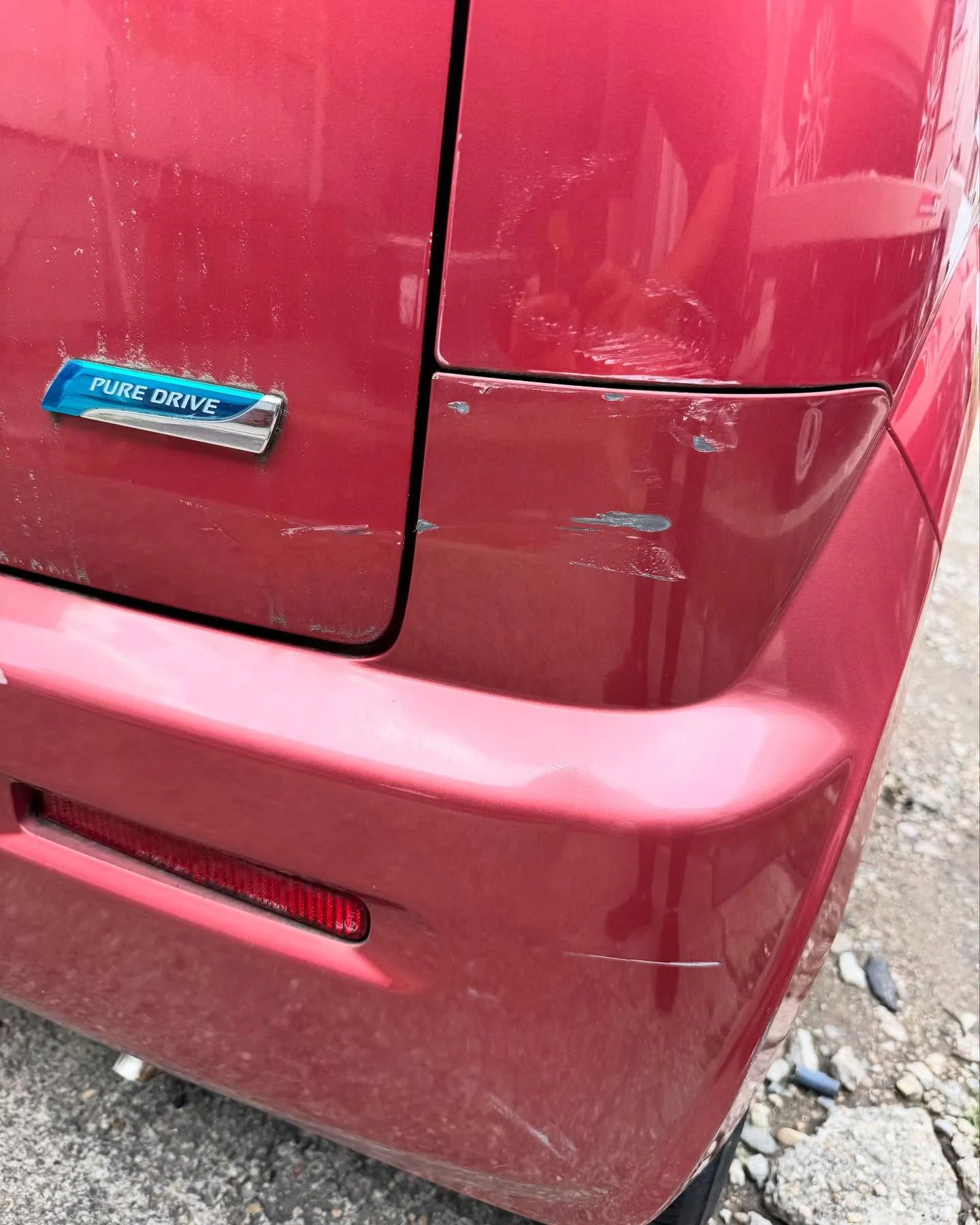 日産モコ　板金修理入庫